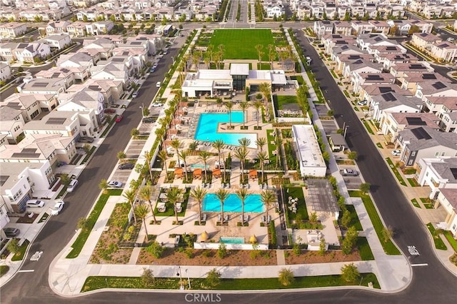 birds eye view of property with a residential view