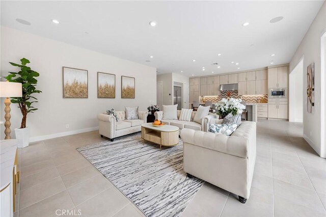 living room with light tile patterned floors