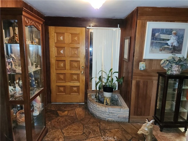 entrance foyer with wooden walls