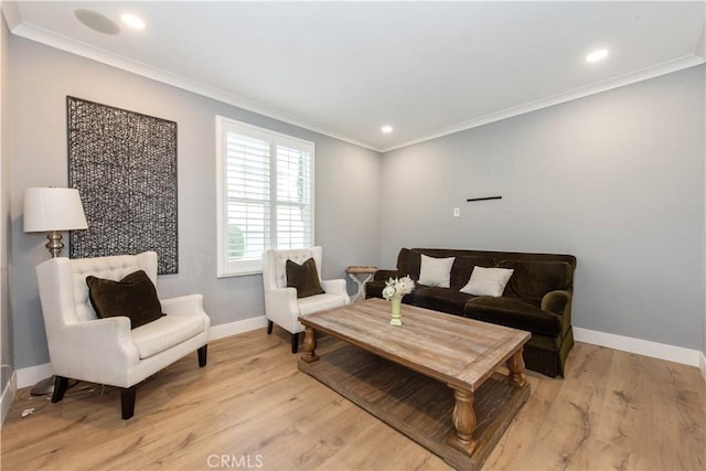 living room featuring light hardwood / wood-style flooring and crown molding