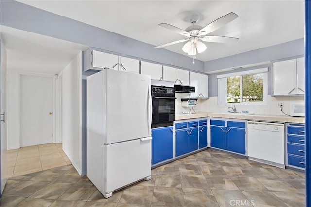 kitchen featuring sink, blue cabinets, white cabinets, and white appliances