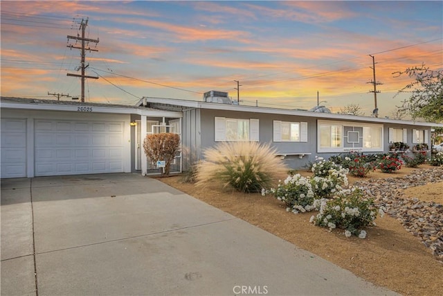 ranch-style home with a garage