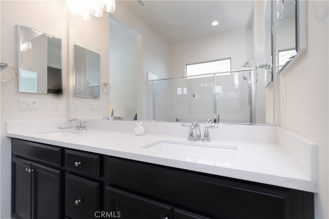 11121 Fourleaf Ct, Corona, CA 92883 - bathroom featuring a stall shower and double vanity
