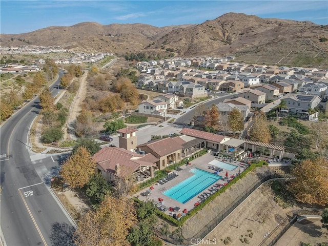 birds eye view of property featuring a mountain view