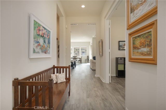 11121 Fourleaf Ct, Corona, CA 92883 - hallway featuring wood finished floors and recessed lighting