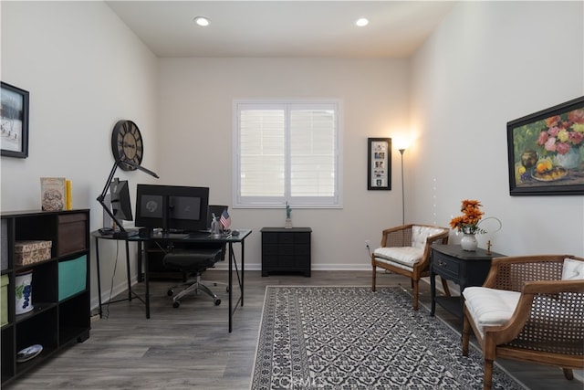 office space with wood-type flooring