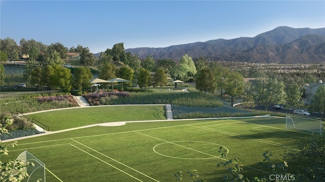 surrounding community featuring a mountain view