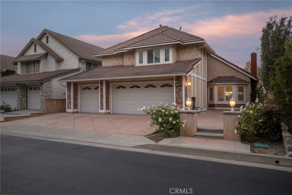 view of front of property featuring a garage