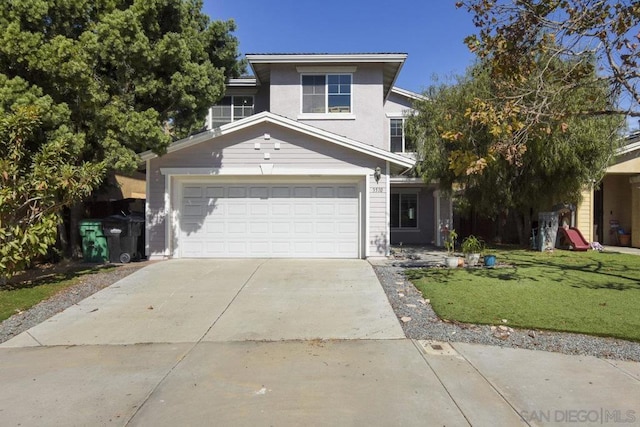 front of property featuring a front yard and a garage