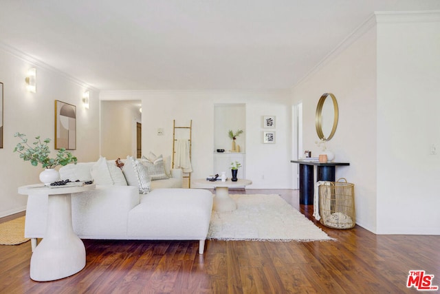 living room with dark wood-type flooring and ornamental molding