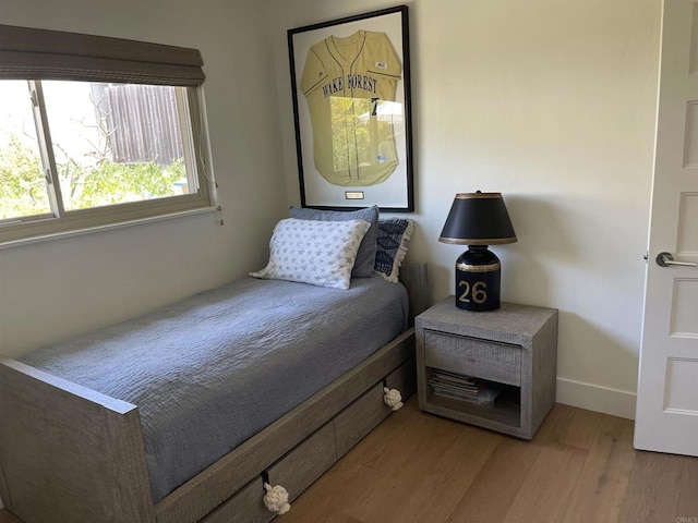 bedroom featuring light wood-type flooring