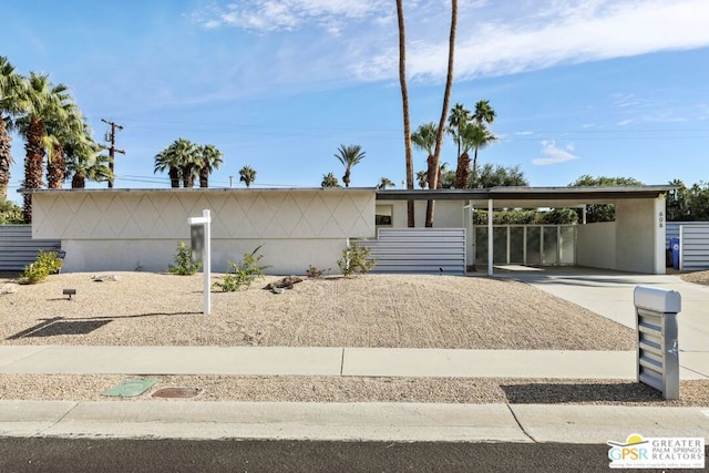 ranch-style house with a carport