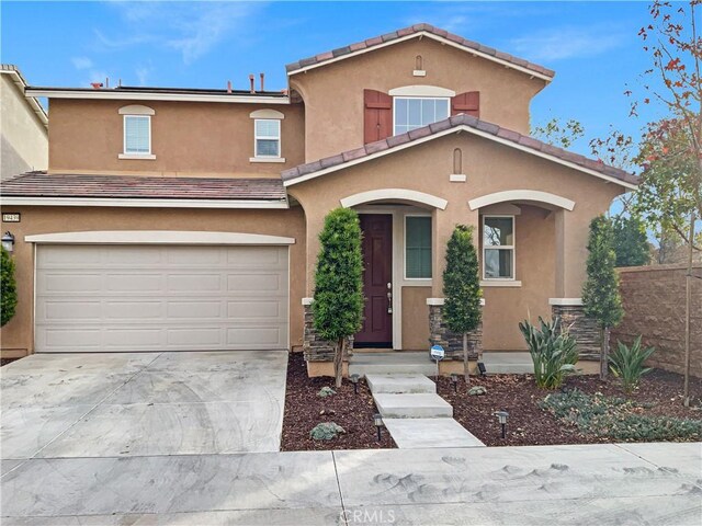 view of front of house with a garage