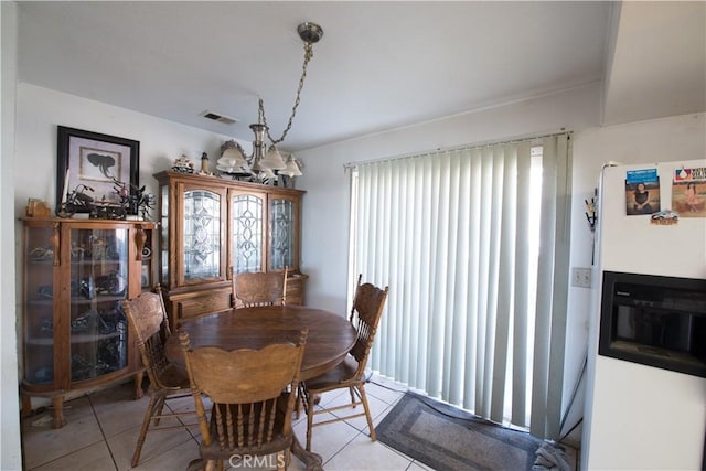 view of tiled dining space