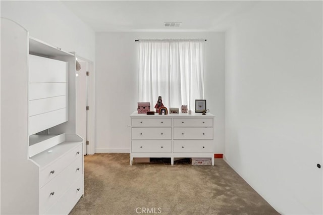 unfurnished bedroom with light carpet