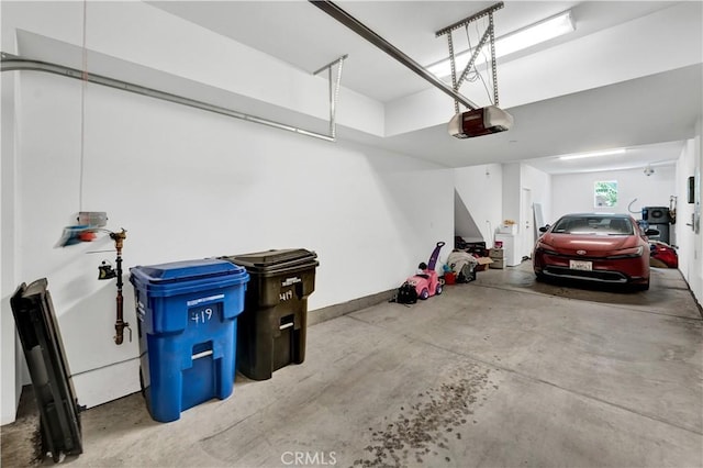 garage featuring a garage door opener