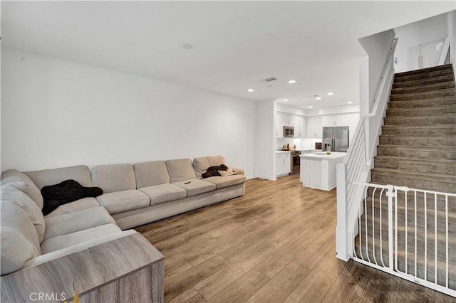 living room featuring wood-type flooring