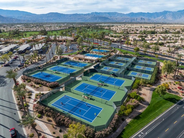 birds eye view of property featuring a mountain view