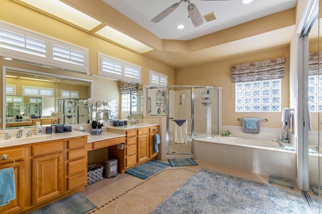 bathroom featuring ceiling fan, vanity, tile patterned flooring, and independent shower and bath