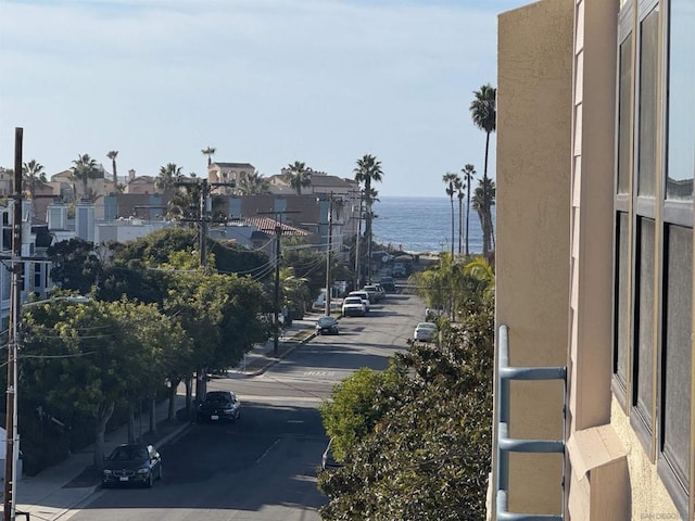 view of street with a water view