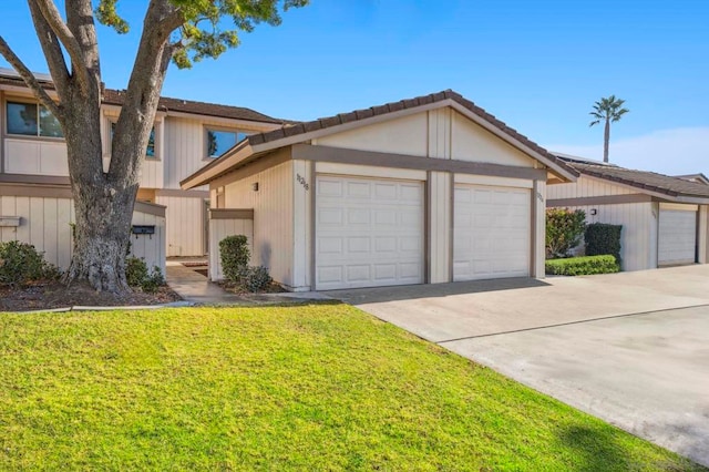 ranch-style home with a front lawn and an outdoor structure