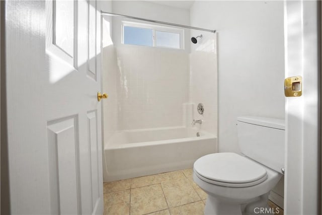 bathroom with toilet, tile patterned floors, and shower / tub combination