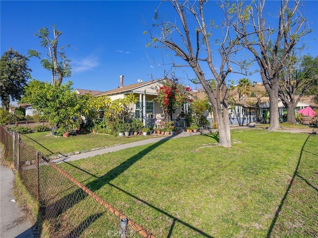 view of front of home with a front yard