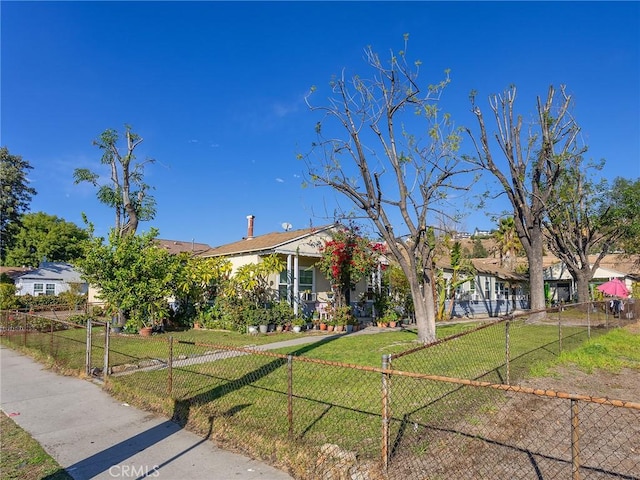 view of front of property with a front lawn