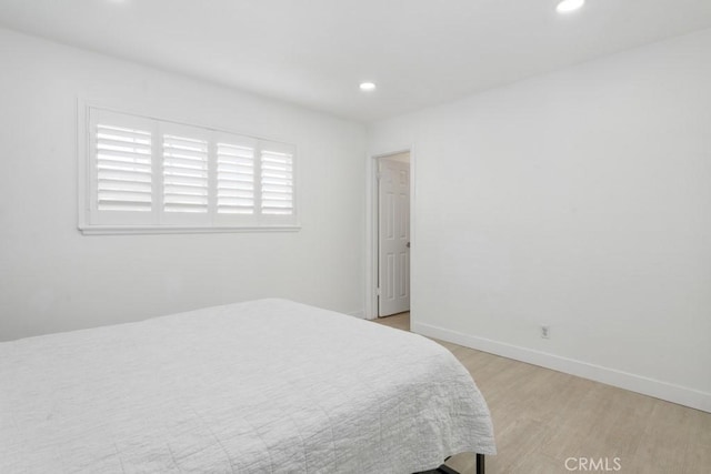 bedroom featuring light hardwood / wood-style flooring