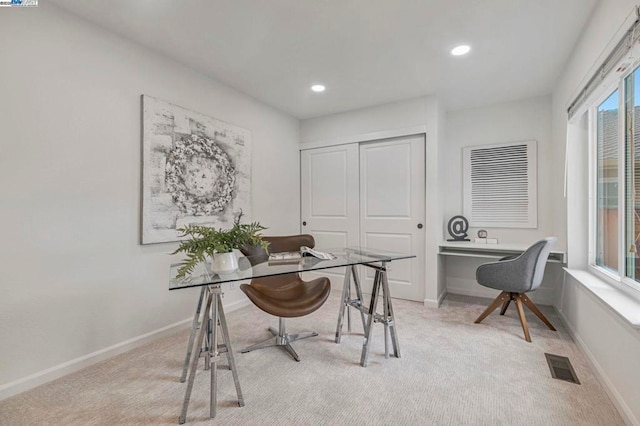 home office featuring light carpet