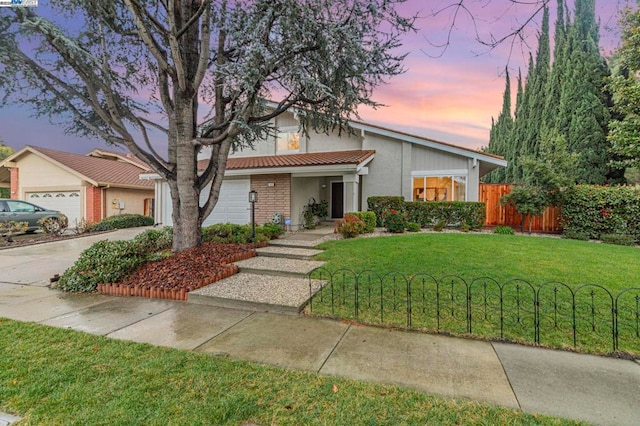 view of front of house with a lawn