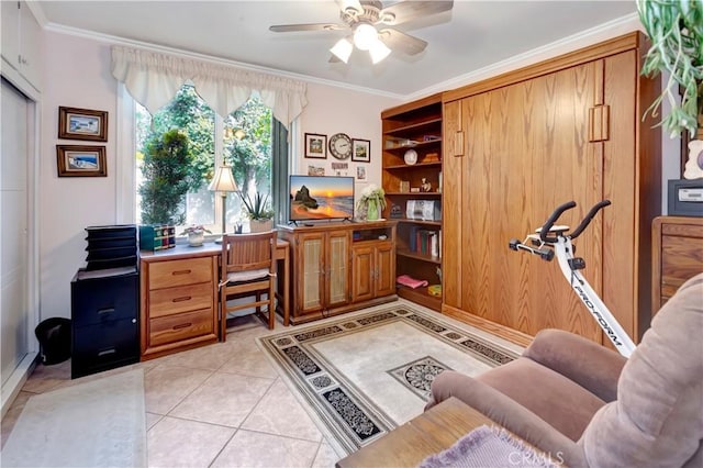 home office with ceiling fan, light tile patterned floors, and ornamental molding