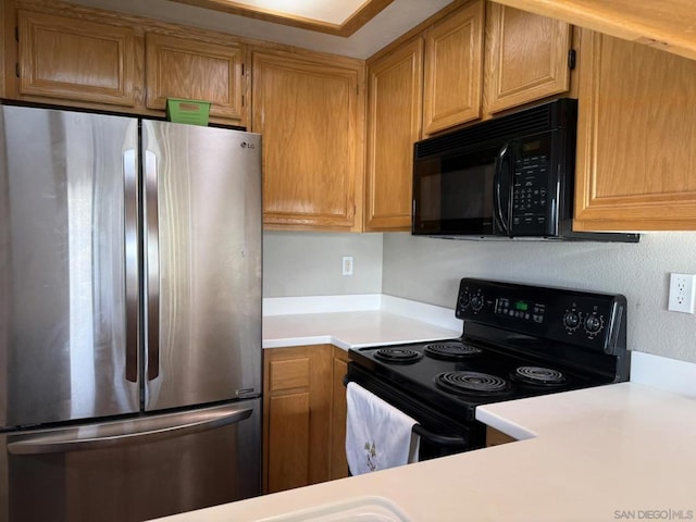 kitchen with black appliances