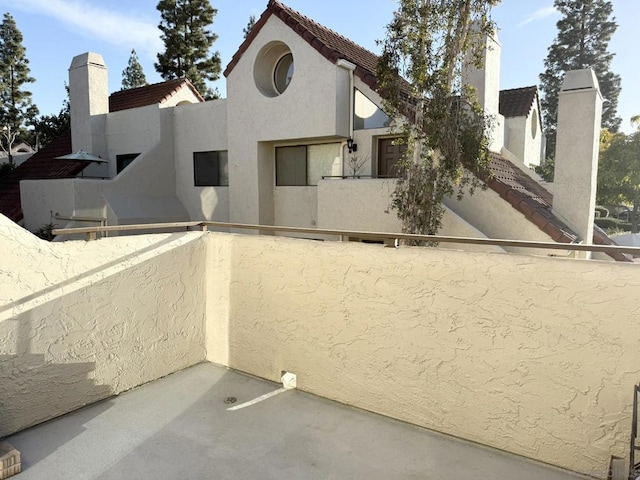 exterior space with a balcony