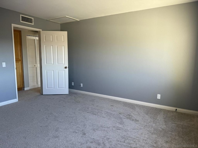 spare room featuring carpet