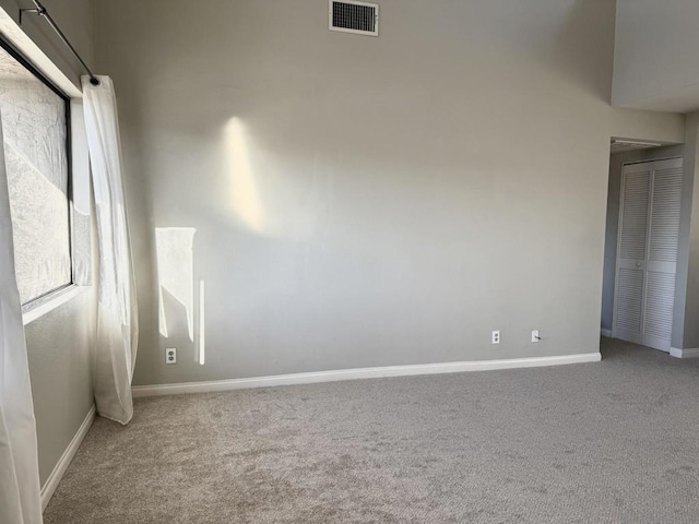 spare room with carpet floors