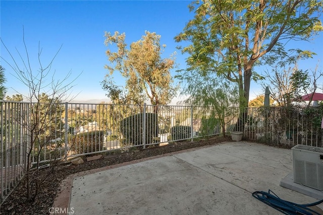 view of patio with central AC