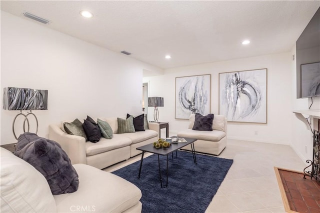 living room with light tile patterned flooring