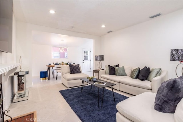 living room with light tile patterned floors