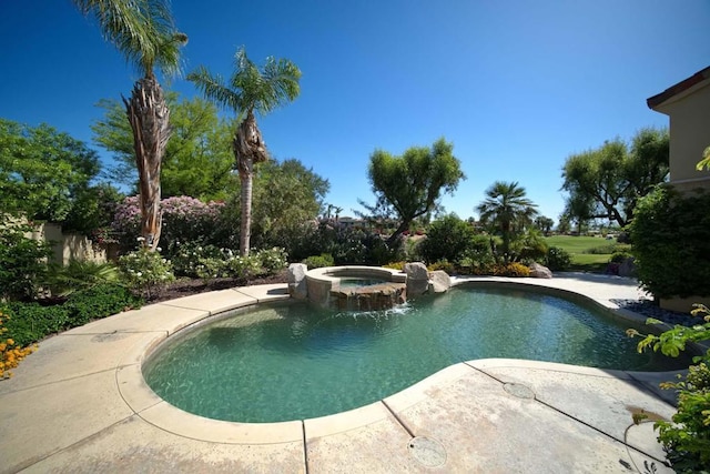 view of swimming pool featuring an in ground hot tub