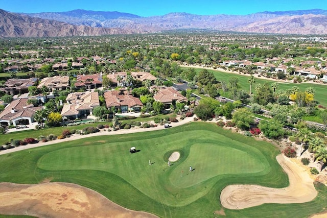 birds eye view of property featuring a mountain view