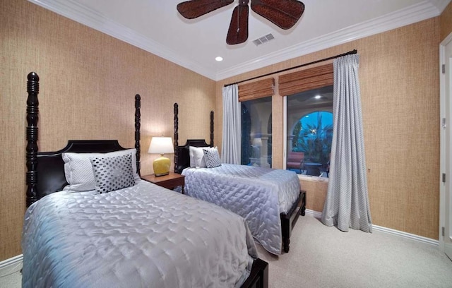 bedroom featuring carpet floors, ceiling fan, and crown molding