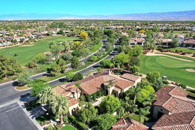 birds eye view of property featuring a mountain view