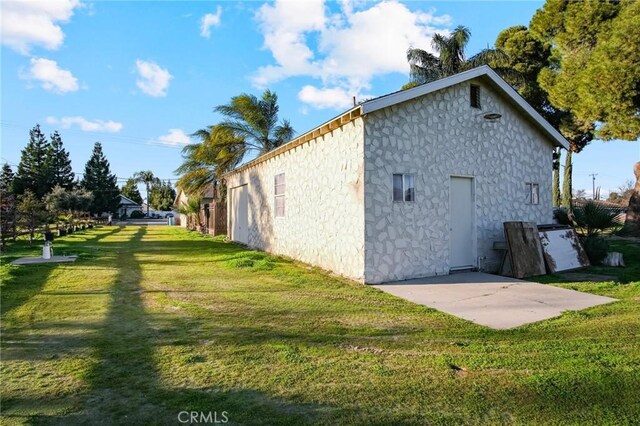 view of home's exterior featuring a lawn