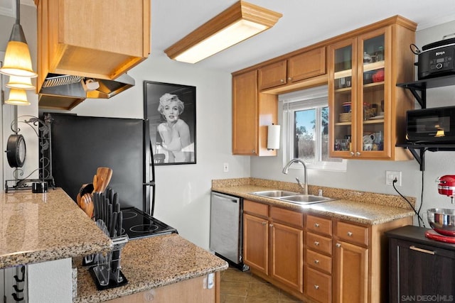 kitchen with sink, light stone counters, decorative light fixtures, fridge, and dishwasher