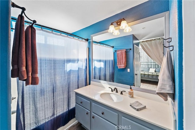 bathroom with shower / bath combo and vanity