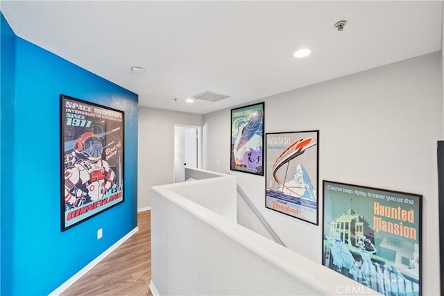 hallway featuring hardwood / wood-style floors