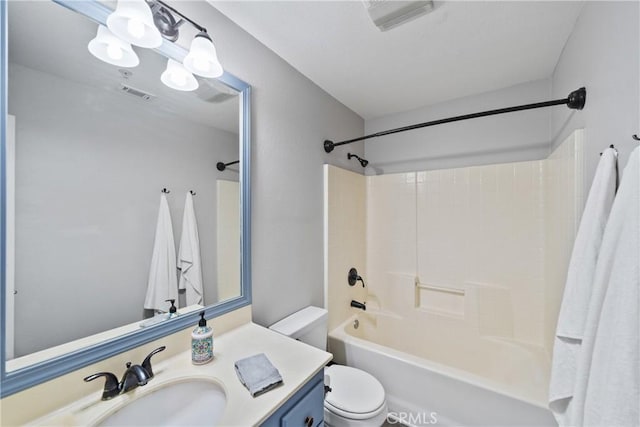 full bathroom featuring vanity, toilet, and washtub / shower combination