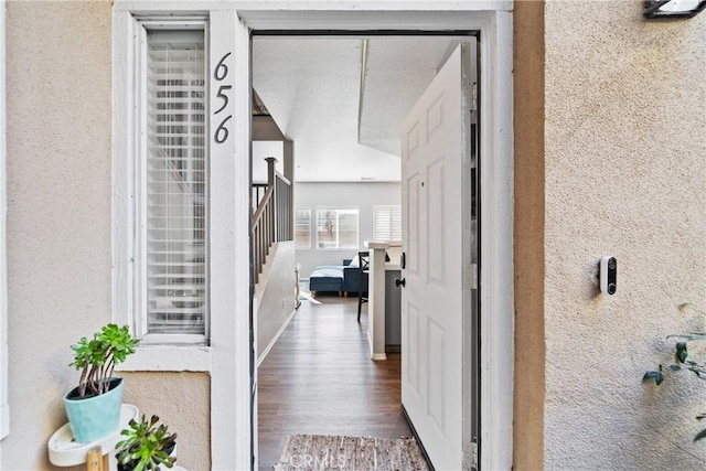 property entrance featuring a balcony