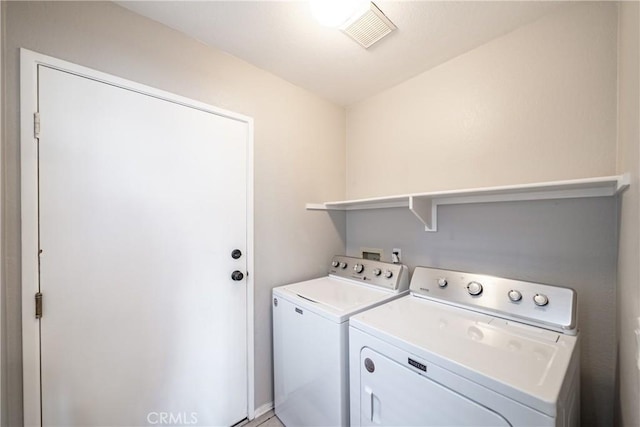 laundry area with washer and dryer